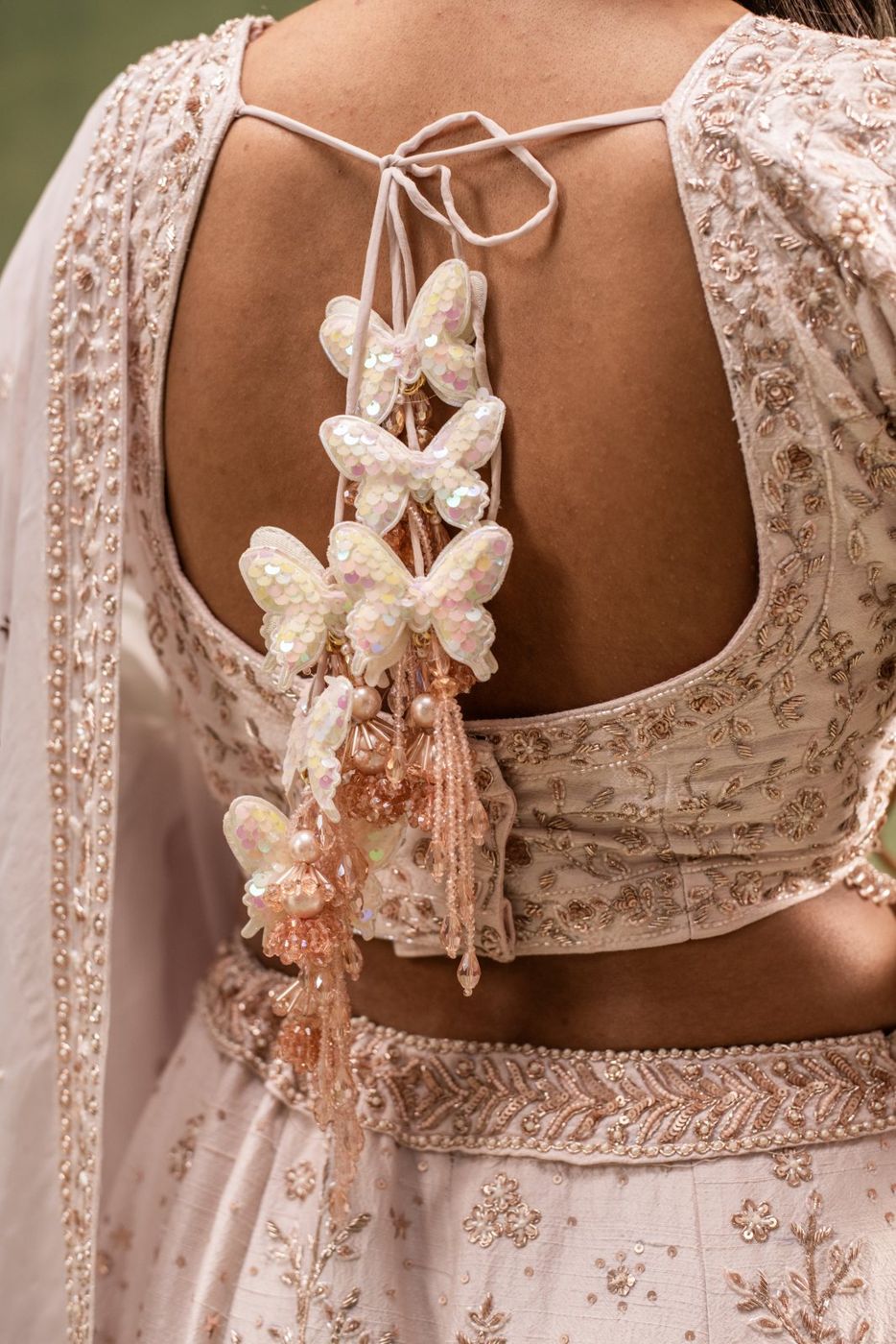 Titli Blouse — ivory blouse with butterfly latkans